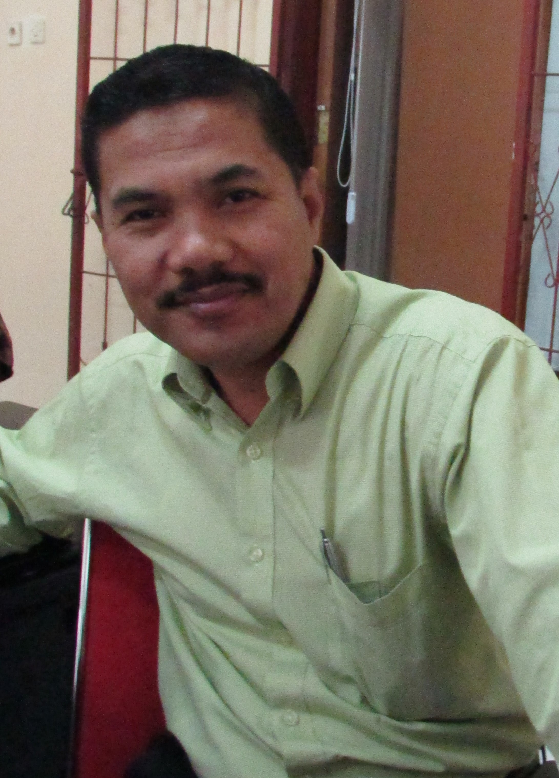 Dr. Iskandar, M.Hum
